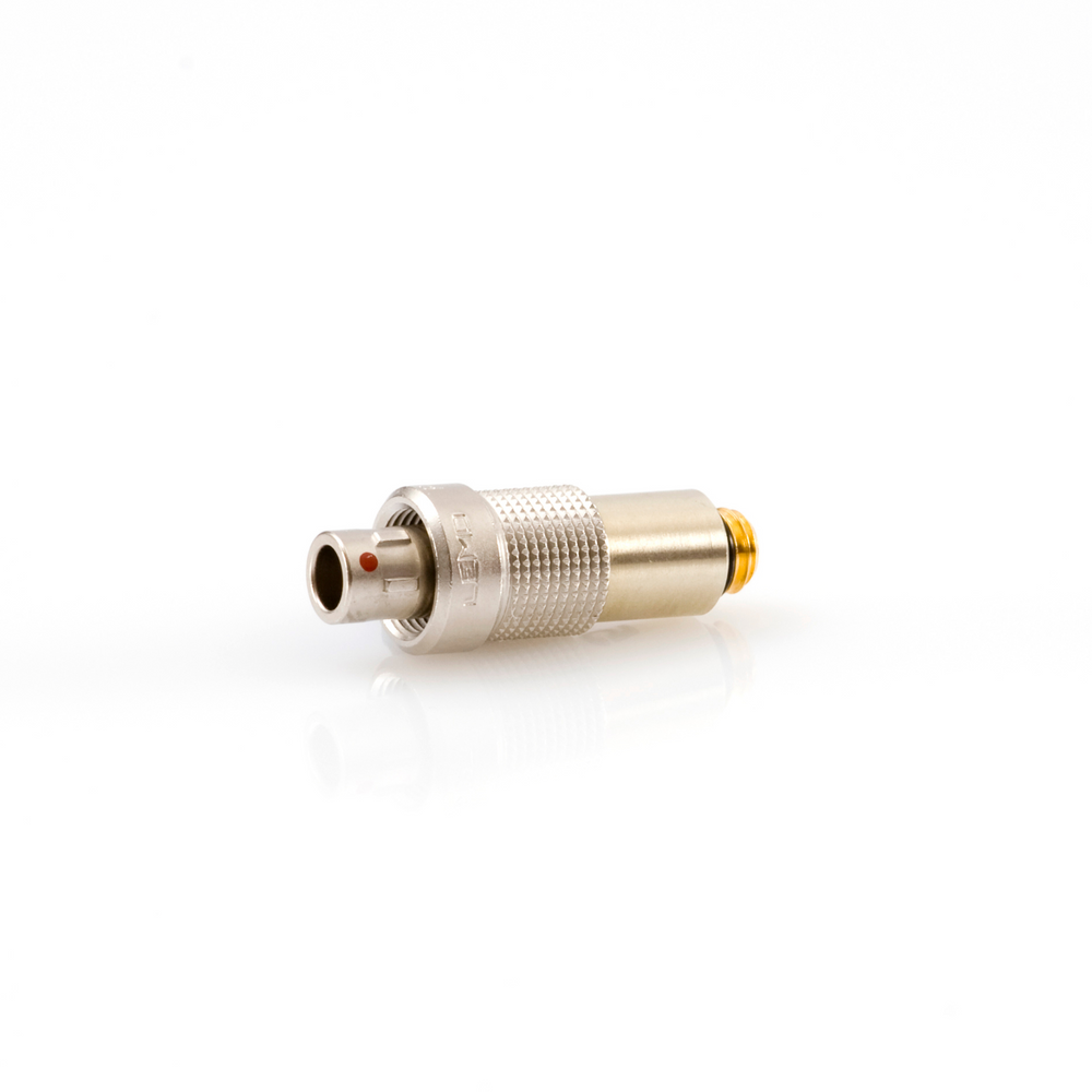 A silver-colored DPA microlock to 3-pin LEMO adapter for microphones.